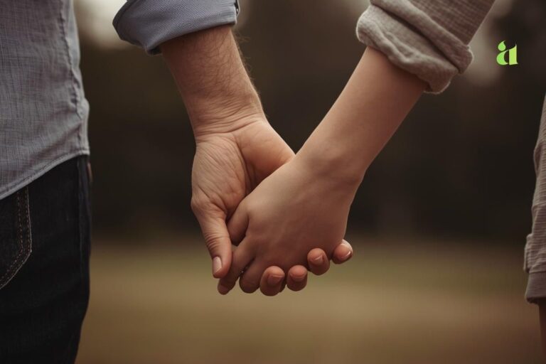 Couple holding hands with emotional connection – the real key to deep love – Aarohi Blog