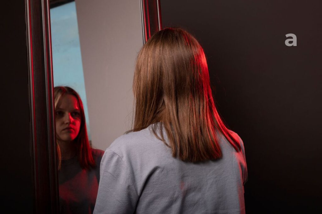 person reflecting quietly on inner dialogue and self talk