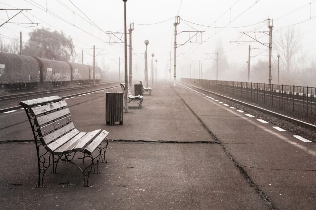 old railway platform bench waiting passengers and memories