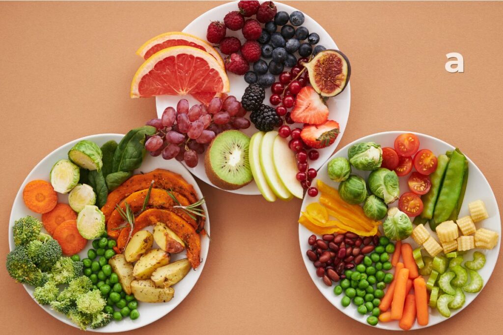 Balanced plate showing healthy portions of protein, whole grains, vegetables, and fruits.