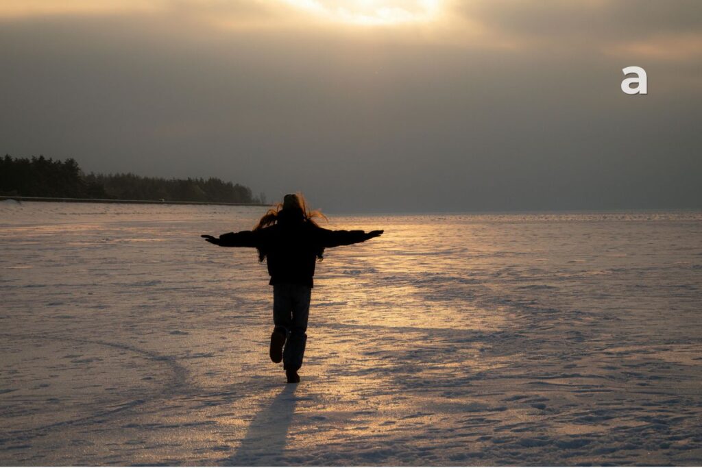 Person walking quietly outdoors as a symbol of choosing today