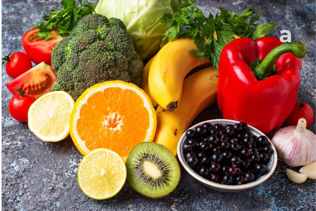 Balanced daily meal plan featuring vitamin C-rich foods including guava, oranges, broccoli, bell peppers, tomatoes, papaya, kiwi, and lemon