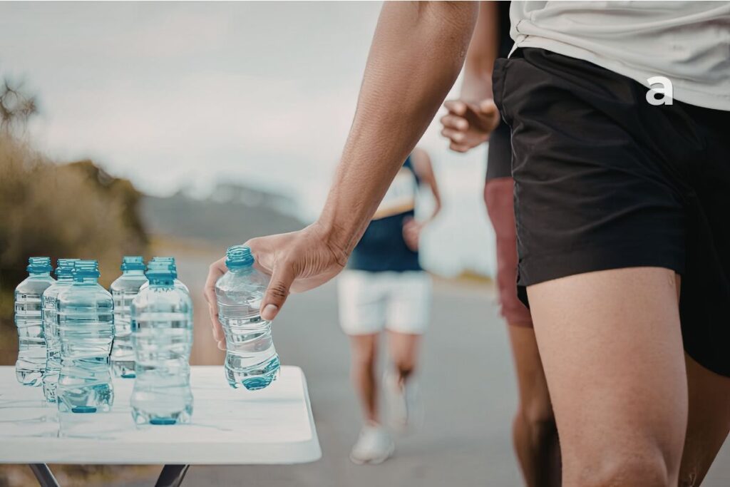 Hydration during exercise and hot weather with water and fluid replacement after sweating