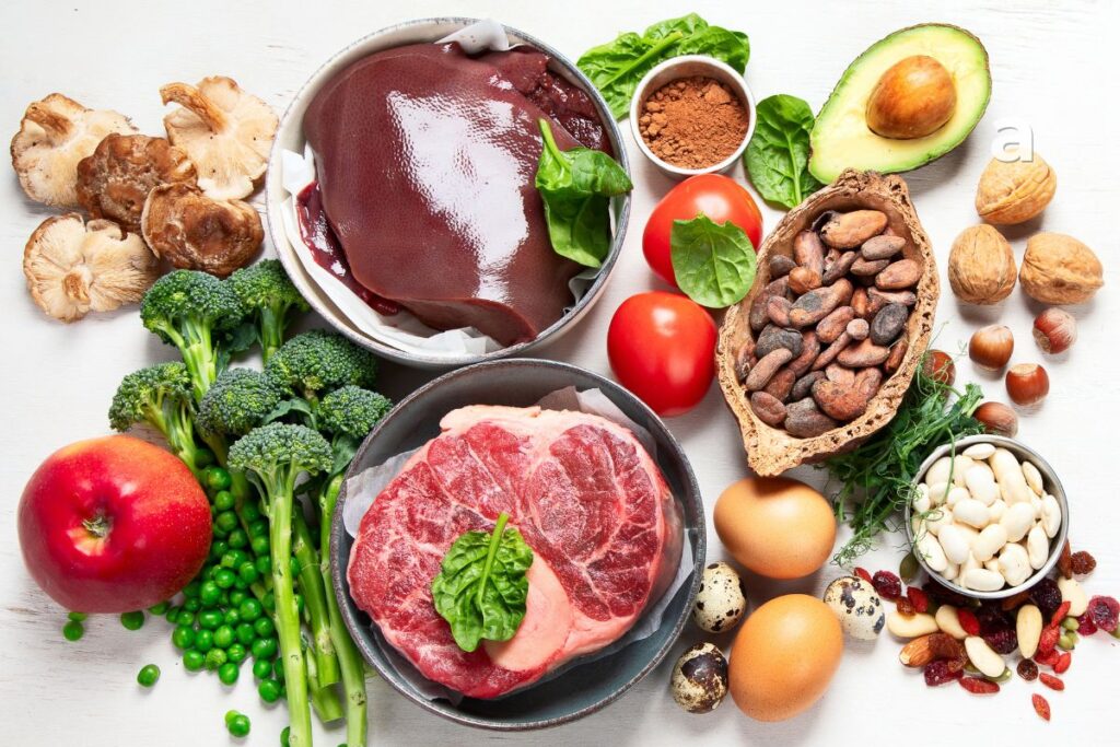 Iron-rich foods including lean beef, lentils, spinach, beans, eggs, pumpkin seeds, and fortified cereals.