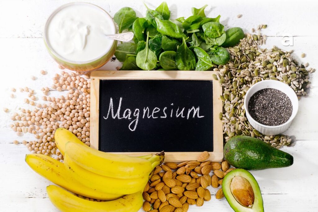 Magnesium-rich foods including pumpkin seeds almonds spinach beans and whole grains