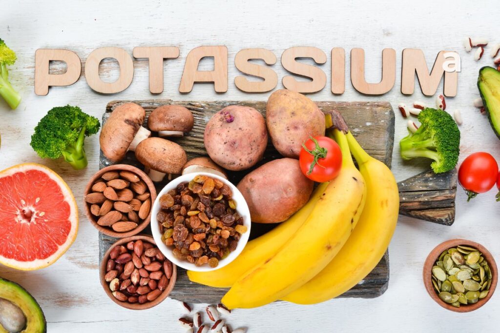 Potassium benefits and potassium-rich foods including bananas potatoes spinach beans yogurt and tomatoes