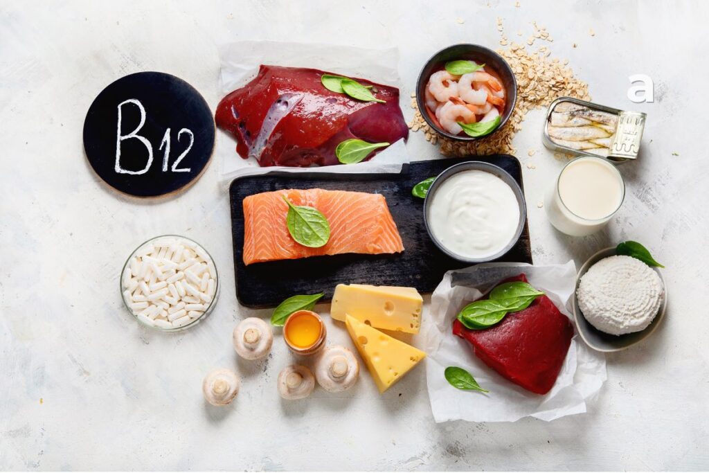 Vitamin B12-rich foods including salmon, eggs, milk, yogurt, cheese, beef, tuna, clams, and fortified breakfast cereals.