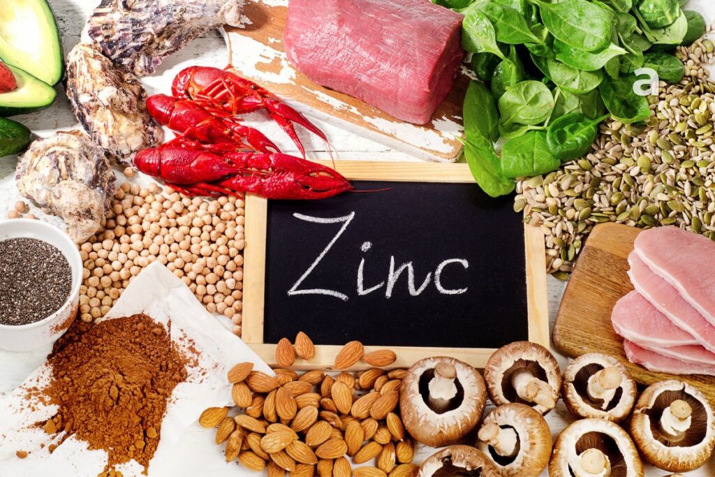 Zinc benefits and zinc-rich foods including oysters, meat, eggs, pumpkin seeds, chickpeas, lentils, nuts, and whole grains