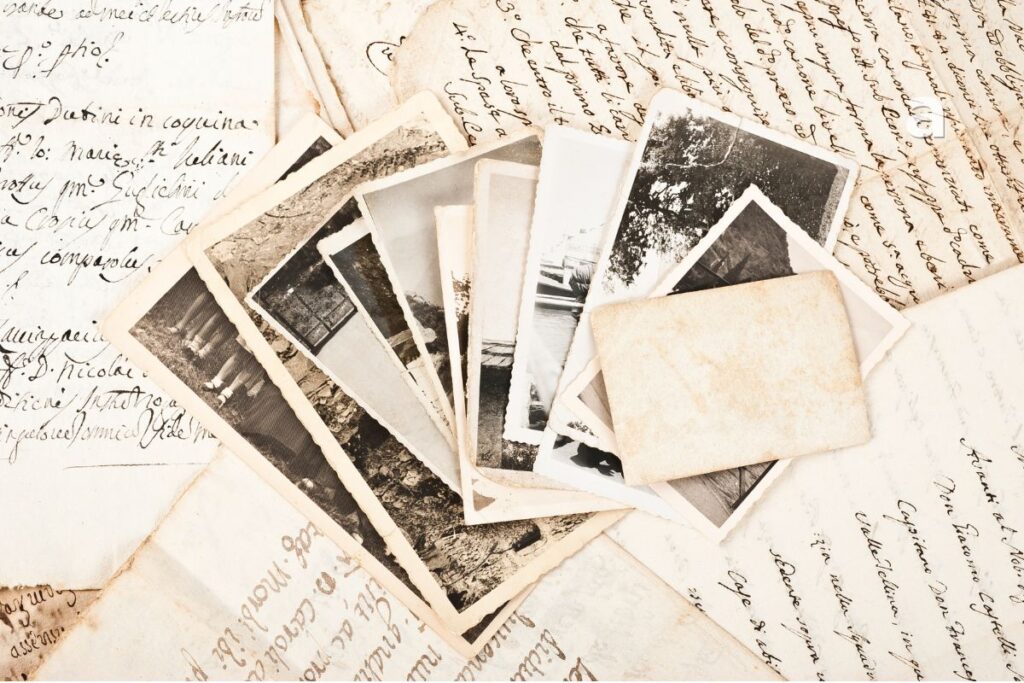 Handwritten letters and an old photograph representing memories and lost love